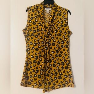 Carmen Marc Valvo tiger print sleeves blouse Size S. 95% Polyester 5% Spandex